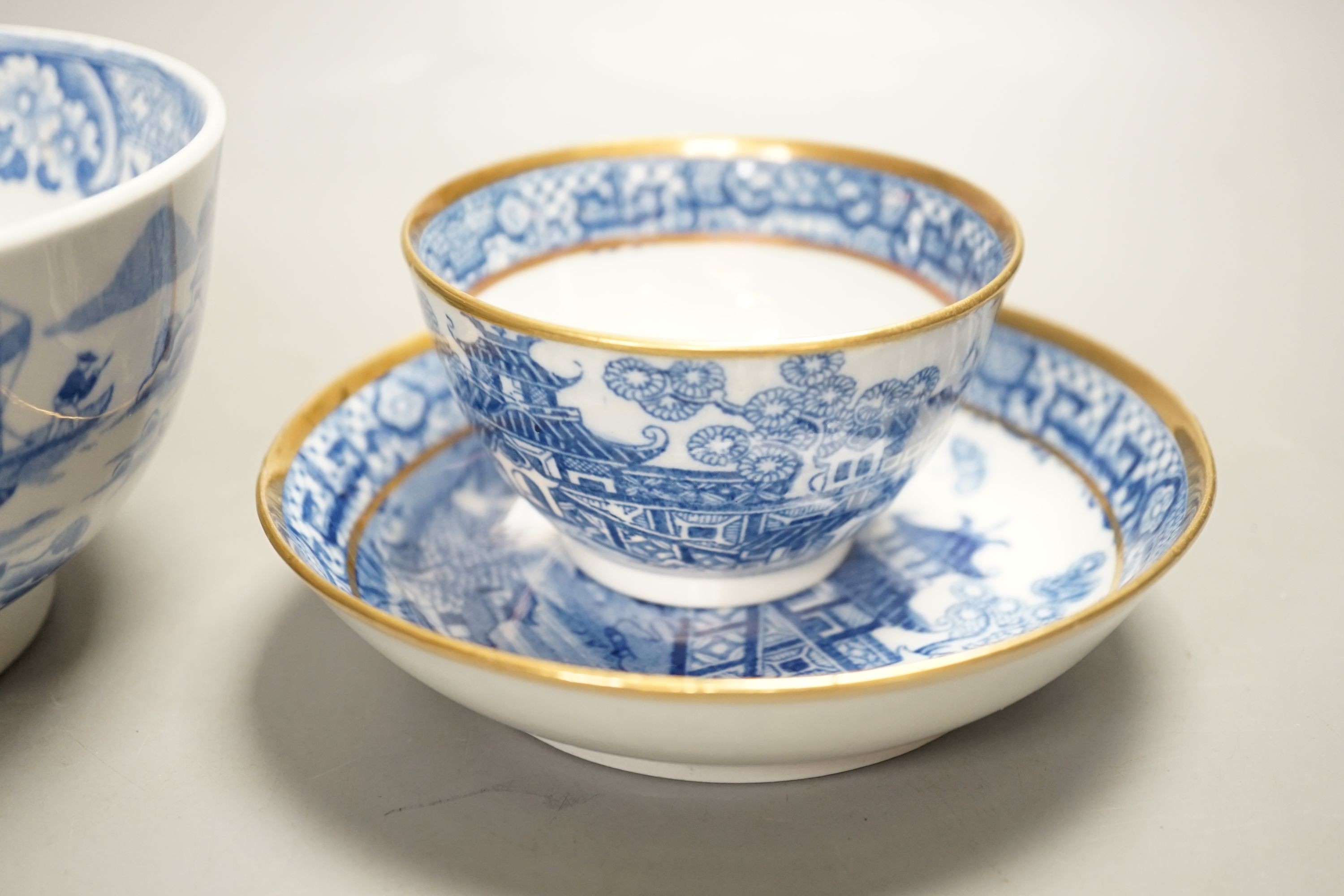 A New Hall slops bowl printed with the 'Duck' pattern and a teabowl and saucer printed with the 'Moth' pattern c.1790, Slops bowl 15.5 cms diameter.